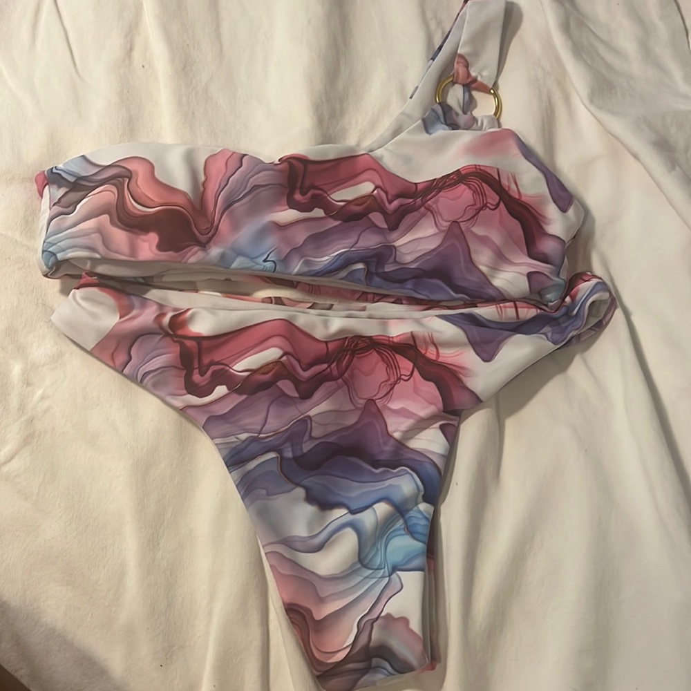 This bathing suit is from SHEIN never worn and very tight fitted.